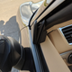 Driver side panel hanging off.